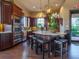 Modern clubhouse kitchen with island and seating at 8752 Bellussi Dr, Sarasota, FL 34238