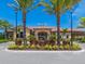 Exterior view of the community clubhouse at 8752 Bellussi Dr, Sarasota, FL 34238