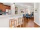 Modern kitchen with stainless steel appliances and granite countertops at 8752 Bellussi Dr, Sarasota, FL 34238