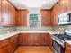 Modern kitchen with stainless steel appliances and granite countertops at 8752 Bellussi Dr, Sarasota, FL 34238
