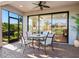 Covered patio with seating area, perfect for outdoor dining at 8752 Bellussi Dr, Sarasota, FL 34238