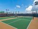 Two well-maintained pickleball courts with surrounding fencing at 8752 Bellussi Dr, Sarasota, FL 34238