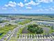 Aerial view of community with lake at 9016 Waxwing Way, Parrish, FL 34219