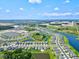 Aerial view of neighborhood and lake at 9016 Waxwing Way, Parrish, FL 34219