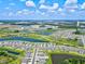 Wide aerial view of community and surrounding area at 9016 Waxwing Way, Parrish, FL 34219