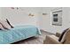 Small bedroom with a twin-size bed and plenty of natural light at 9016 Waxwing Way, Parrish, FL 34219