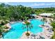 Relaxing community pool with lap lanes and plenty of lounge chairs at 9016 Waxwing Way, Parrish, FL 34219