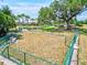 Large fenced dog park with benches and waste disposal at 9016 Waxwing Way, Parrish, FL 34219