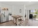 Kitchen nook with breakfast table and access to the backyard at 9016 Waxwing Way, Parrish, FL 34219