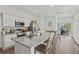 Modern kitchen with stainless steel appliances and granite countertops at 9016 Waxwing Way, Parrish, FL 34219