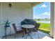 Cozy patio with table and chairs, perfect for outdoor dining at 9016 Waxwing Way, Parrish, FL 34219