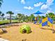 Modern playground with shade canopy and play equipment at 9016 Waxwing Way, Parrish, FL 34219
