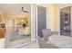 Balcony with table and chairs, overlooking the living room at 915 Seaside Dr # 312 Weeks 16-17, Sarasota, FL 34242
