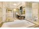 Spa-like bathroom with a soaking tub, walk-in shower, and double vanity at 915 Seaside Dr # 312 Weeks 16-17, Sarasota, FL 34242
