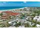 Aerial view of property near beach, showing location relative to surrounding buildings and streets at 1125 N Moonmist Ct # L5, Sarasota, FL 34242