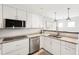 Updated kitchen, featuring granite countertops and stainless steel appliances at 1125 N Moonmist Ct # L5, Sarasota, FL 34242