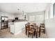 Modern kitchen with stainless steel appliances and a breakfast nook at 1125 N Moonmist Ct # L5, Sarasota, FL 34242
