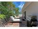 Spacious patio with lounge chairs and a grill at 1125 N Moonmist Ct # L5, Sarasota, FL 34242