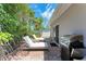 Spacious patio with lounge chairs and a grill at 1125 N Moonmist Ct # L5, Sarasota, FL 34242