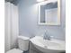 Simple bathroom with white vanity and shower at 13630 County Road 675, Parrish, FL 34219