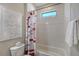 Simple bathroom with shower/tub combo and neutral color scheme at 17022 Cresswind Ter, Lakewood Ranch, FL 34211