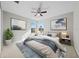 Bright bedroom with neutral walls, a cozy bed, and two windows offering lovely outside views at 1743 Pinyon Pine Dr, Sarasota, FL 34240