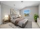 Comfortable bedroom with natural light, stylish furnishings, and neutral color palette at 1743 Pinyon Pine Dr, Sarasota, FL 34240
