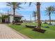 Beautiful common space with palm trees, a brewery, and Gathering game area at 1743 Pinyon Pine Dr, Sarasota, FL 34240
