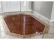 Elegant foyer with decorative tile inlay and bright natural light at 1743 Pinyon Pine Dr, Sarasota, FL 34240
