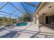 Outdoor living area with sparkling pool and spa at 1743 Pinyon Pine Dr, Sarasota, FL 34240