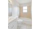 Clean bathroom with a shower/tub combo and white vanity at 2410 13Th W St, Palmetto, FL 34221