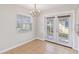 Cozy dining area with French doors leading to the backyard at 2410 13Th W St, Palmetto, FL 34221