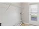 Laundry room with shelving, washer and dryer hookups at 2410 13Th W St, Palmetto, FL 34221