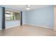 Spacious bedroom with light blue walls and tile floors at 2908 61St W St, Bradenton, FL 34209