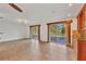 Living area with a view of the deck through sliding glass doors, enhancing natural light at 2961 Homasassa Rd, Sarasota, FL 34239