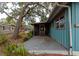 Screened porch and large oak tree at 3128 Bay St, Sarasota, FL 34237