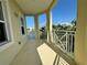 Spacious balcony overlooking a lake with a water fountain at 3404 79Th Street W Cir # 203, Bradenton, FL 34209
