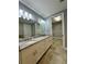 Double vanity bathroom with granite countertop at 3404 79Th Street W Cir # 203, Bradenton, FL 34209