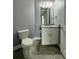 Bathroom with toilet, vanity and granite countertop at 3404 79Th Street W Cir # 203, Bradenton, FL 34209