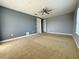 Spacious bedroom with neutral decor and ceiling fan at 3404 79Th Street W Cir # 203, Bradenton, FL 34209