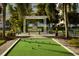 Outdoor bocce ball court and grilling area at 3404 79Th Street W Cir # 203, Bradenton, FL 34209
