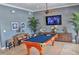 Game room with pool table and comfortable seating at 3404 79Th Street W Cir # 203, Bradenton, FL 34209