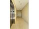 Clean and bright hallway with elevator access, showing apartment building interior at 3404 79Th Street W Cir # 203, Bradenton, FL 34209