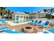 Resort-style pool with fire pit and lounge chairs at 3404 79Th Street W Cir # 203, Bradenton, FL 34209