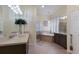 Elegant bathroom with double vanity, soaking tub, and separate shower at 3618 Summerwind Cir, Bradenton, FL 34209