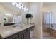 Bathroom boasts a double vanity and large walk-in shower at 3618 Summerwind Cir, Bradenton, FL 34209