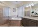 Relaxing bathroom with soaking tub and separate shower at 3618 Summerwind Cir, Bradenton, FL 34209