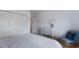 Bright bedroom with a dresser, chair, and large closet at 3618 Summerwind Cir, Bradenton, FL 34209