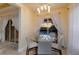 Casual breakfast nook with glass table and chairs, overlooking the pool at 3618 Summerwind Cir, Bradenton, FL 34209