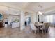 Open concept dining room with seating for six and views into living room at 3618 Summerwind Cir, Bradenton, FL 34209